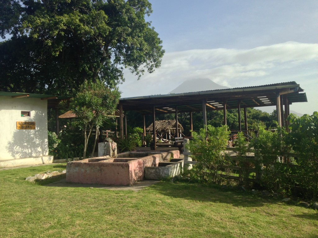 The event space with natural pool, barbeque, and views of the entire area.