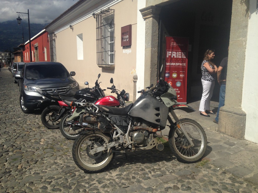 Oscar has parking with some friends in front of the entrance.